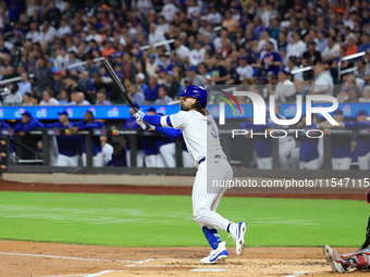 Jesse Winker of the New York Mets, #3, connects for a grand slam home run during the first inning of the baseball game against the Boston Re...