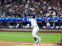 Jesse Winker of the New York Mets, #3, connects for a grand slam home run during the first inning of the baseball game against the Boston Re...