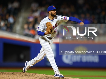 New York Mets relief pitcher Danny Young #81 throws during the seventh inning of the baseball game against the Boston Red Sox at Citi Field...