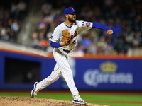 New York Mets relief pitcher Danny Young #81 throws during the seventh inning of the baseball game against the Boston Red Sox at Citi Field...