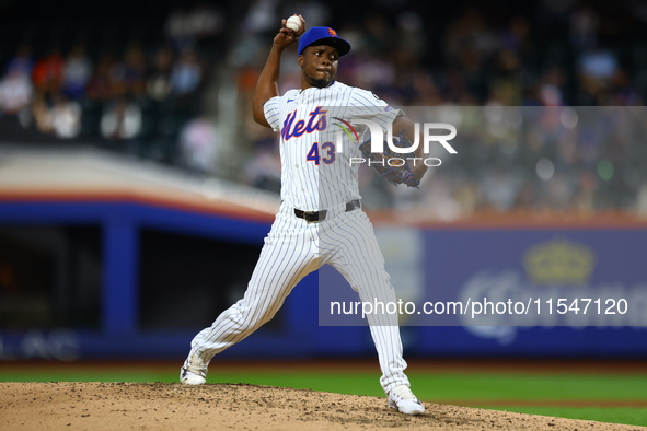 New York Mets relief pitcher Huascar Brazoban #43 throws during the sixth inning of the baseball game against the Boston Red Sox at Citi Fie...