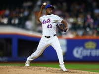 New York Mets relief pitcher Huascar Brazoban #43 throws during the sixth inning of the baseball game against the Boston Red Sox at Citi Fie...