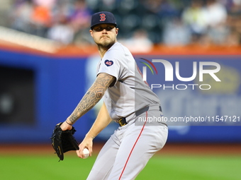 Boston Red Sox pitcher Tanner Houck #89 throws during the first inning of the baseball game against the New York Mets at Citi Field in Coron...