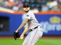 Boston Red Sox pitcher Tanner Houck #89 throws during the first inning of the baseball game against the New York Mets at Citi Field in Coron...