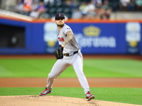 Boston Red Sox pitcher Tanner Houck #89 throws during the first inning of the baseball game against the New York Mets at Citi Field in Coron...