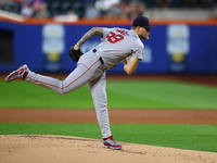 Boston Red Sox pitcher Tanner Houck #89 throws during the first inning of the baseball game against the New York Mets at Citi Field in Coron...