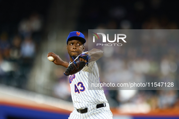 New York Mets relief pitcher Huascar Brazoban #43 throws during the sixth inning of the baseball game against the Boston Red Sox at Citi Fie...