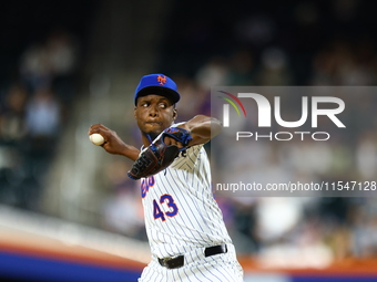 New York Mets relief pitcher Huascar Brazoban #43 throws during the sixth inning of the baseball game against the Boston Red Sox at Citi Fie...