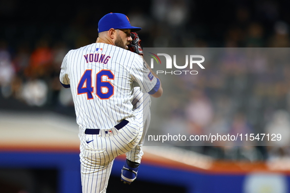 New York Mets relief pitcher Alex Young #46 throws during the fifth inning of the baseball game against the Boston Red Sox at Citi Field in...