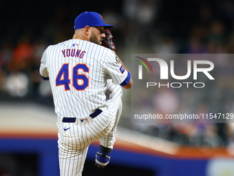 New York Mets relief pitcher Alex Young #46 throws during the fifth inning of the baseball game against the Boston Red Sox at Citi Field in...