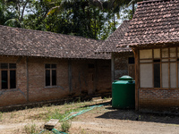 A number of water hoses are around the house and road surface during drought season in Selopamioro Village, Bantul Regency, Yogyakarta Provi...