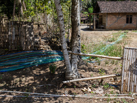 A number of water hoses are around the house and road surface during drought season in Selopamioro Village, Bantul Regency, Yogyakarta Provi...