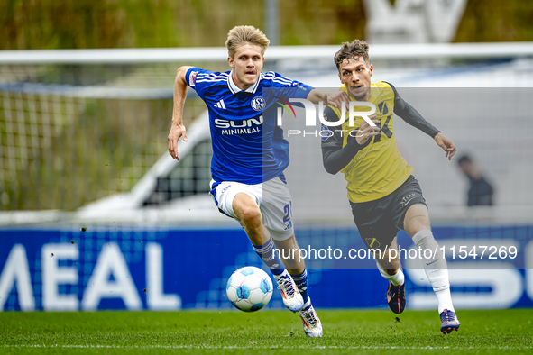 SC Schalke 04 player Martin Wasinski and NAC player Roy Kuijpers during the match Schalke 04 vs. NAC (friendly) at the Parkstadium for the D...