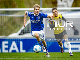 SC Schalke 04 player Martin Wasinski and NAC player Roy Kuijpers during the match Schalke 04 vs. NAC (friendly) at the Parkstadium for the D...