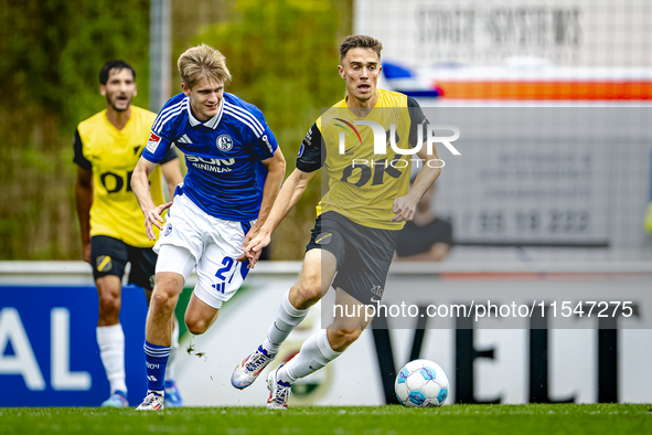 SC Schalke 04 player Martin Wasinski and NAC player Max Balard during the match Schalke 04 vs. NAC (friendly) at the Parkstadium for the Dut...