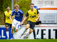 SC Schalke 04 player Martin Wasinski and NAC player Max Balard during the match Schalke 04 vs. NAC (friendly) at the Parkstadium for the Dut...