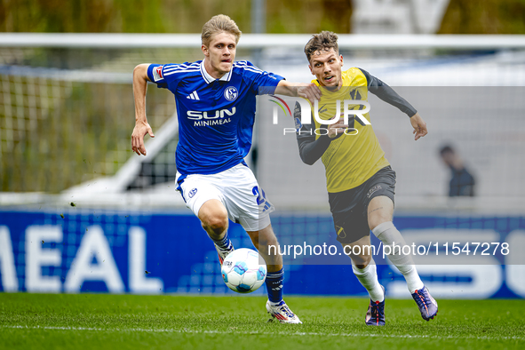 SC Schalke 04 player Martin Wasinski and NAC player Roy Kuijpers during the match Schalke 04 vs. NAC (friendly) at the Parkstadium for the D...