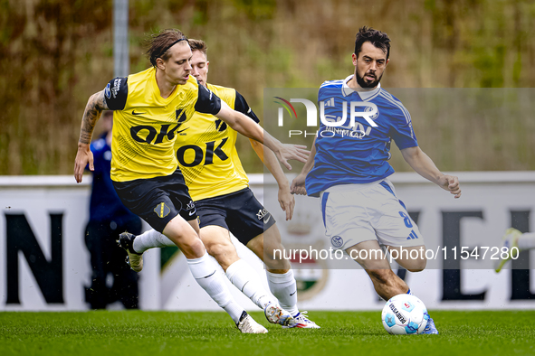 NAC player Elias Mar Omarsson and SC Schalke 04 player Amin Younes during the match Schalke 04 vs. NAC (friendly) at the Parkstadium for the...