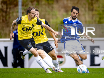 NAC player Elias Mar Omarsson and SC Schalke 04 player Amin Younes during the match Schalke 04 vs. NAC (friendly) at the Parkstadium for the...