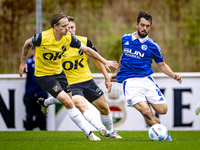 NAC player Elias Mar Omarsson and SC Schalke 04 player Amin Younes during the match Schalke 04 vs. NAC (friendly) at the Parkstadium for the...