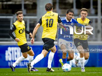 SC Schalke 04 player Ilyes Hamache and NAC player Max Balard during the match Schalke 04 vs. NAC (friendly) at the Parkstadium for the Dutch...