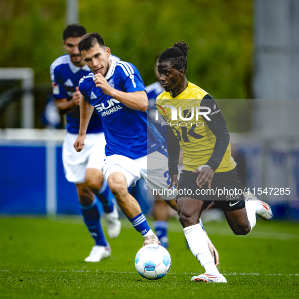 SC Schalke 04 player Mehmet Can Aydin and NAC player Sana Fernandes during the match Schalke 04 vs. NAC (friendly) at the Parkstadium for th...