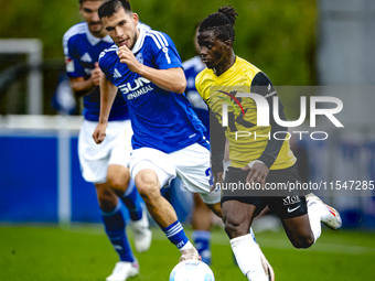 SC Schalke 04 player Mehmet Can Aydin and NAC player Sana Fernandes during the match Schalke 04 vs. NAC (friendly) at the Parkstadium for th...