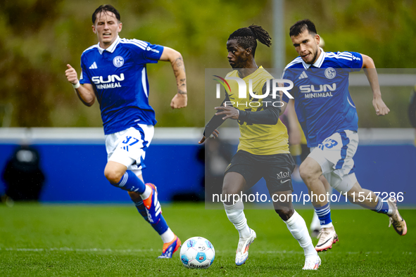 SC Schalke 04 player Mehmet Can Aydin and NAC player Sana Fernandes during the match Schalke 04 vs. NAC (friendly) at the Parkstadium for th...