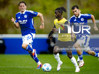 SC Schalke 04 player Mehmet Can Aydin and NAC player Sana Fernandes during the match Schalke 04 vs. NAC (friendly) at the Parkstadium for th...