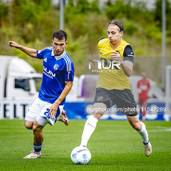 SC Schalke 04 player Mehmet Can Aydin and NAC player Elias Mar Omarsson during the match Schalke 04 vs. NAC (friendly) at the Parkstadium fo...