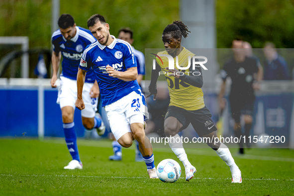 SC Schalke 04 player Mehmet Can Aydin and NAC player Sana Fernandes during the match Schalke 04 vs. NAC (friendly) at the Parkstadium for th...