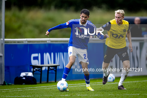 SC Schalke 04 player Ilyes Hamache and NAC player Casper Staring during the match Schalke 04 vs. NAC (friendly) at the Parkstadium in Gelsen...