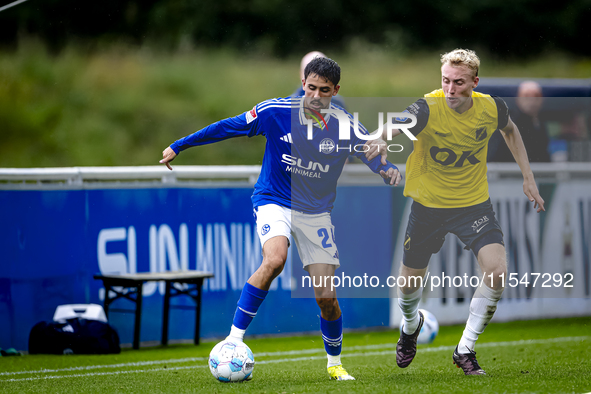 SC Schalke 04 player Ilyes Hamache and NAC player Casper Staring during the match Schalke 04 vs. NAC (friendly) at the Parkstadium in Gelsen...