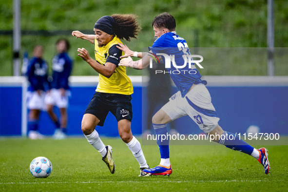 NAC player Adam Kaied and SC Schalke 04 player Max Gruger during the match Schalke 04 vs. NAC (friendly) at the Parkstadium for the Dutch Er...