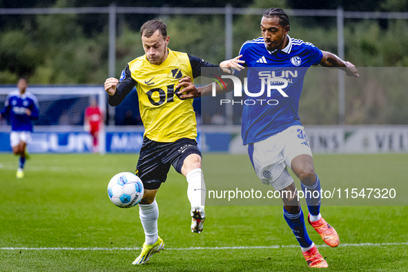 NAC player Boyd Lucassen and SC Schalke 04 player Anton Leander Donkor during the match Schalke 04 vs. NAC (friendly) at the Parkstadium for...