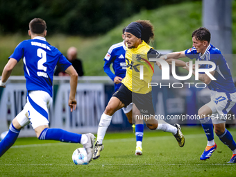 NAC player Adam Kaied and SC Schalke 04 player Max Gruger during the match Schalke 04 vs. NAC (friendly) at the Parkstadium for the Dutch Er...