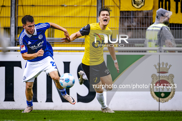 SC Schalke 04 player Mehmet Can Aydin and NAC player Kacper Kostorz during the match Schalke 04 vs. NAC (friendly) at the Parkstadium in Gel...