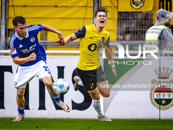 SC Schalke 04 player Mehmet Can Aydin and NAC player Kacper Kostorz during the match Schalke 04 vs. NAC (friendly) at the Parkstadium in Gel...