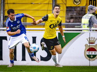 SC Schalke 04 player Mehmet Can Aydin and NAC player Kacper Kostorz during the match Schalke 04 vs. NAC (friendly) at the Parkstadium in Gel...