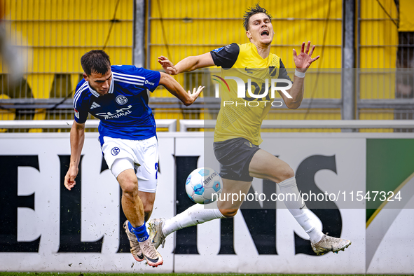 SC Schalke 04 player Mehmet Can Aydin and NAC player Kacper Kostorz during the match Schalke 04 vs. NAC (friendly) at the Parkstadium in Gel...