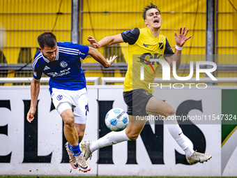 SC Schalke 04 player Mehmet Can Aydin and NAC player Kacper Kostorz during the match Schalke 04 vs. NAC (friendly) at the Parkstadium in Gel...