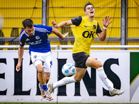 SC Schalke 04 player Mehmet Can Aydin and NAC player Kacper Kostorz during the match Schalke 04 vs. NAC (friendly) at the Parkstadium in Gel...