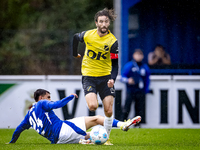 SC Schalke 04 player Ilyes Hamache and NAC player Jan van den Berg during the match Schalke 04 vs. NAC (friendly) at the Parkstadium for the...