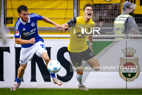 SC Schalke 04 player Mehmet Can Aydin and NAC player Kacper Kostorz during the match Schalke 04 vs. NAC (friendly) at the Parkstadium in Gel...