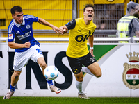 SC Schalke 04 player Mehmet Can Aydin and NAC player Kacper Kostorz during the match Schalke 04 vs. NAC (friendly) at the Parkstadium in Gel...