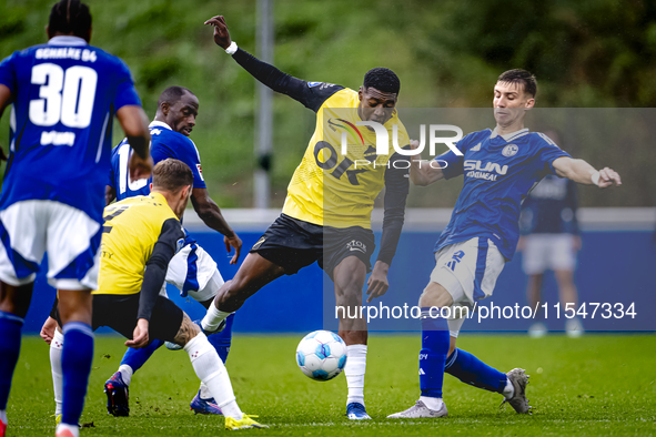 NAC player Cherrion Valerius and SC Schalke 04 player Felipe Sanchez during the match Schalke 04 vs. NAC (friendly) at the Parkstadium for t...