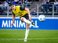 NAC player Kacper Kostorz participates in the match between Schalke 04 and NAC (friendly) at the Parkstadium for the Dutch Eredivisie season...