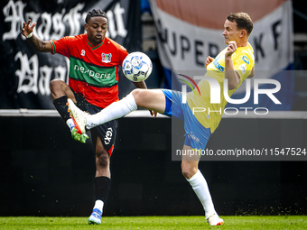 NEC player Sontje Hansen and RKC player Julian Lelieveld during the match RKC vs. NEC (friendly) at the Mandemakers Stadium for the Dutch Er...