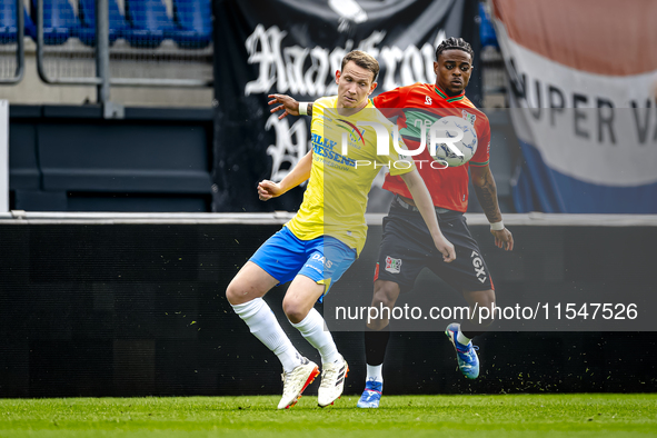 NEC player Sontje Hansen and RKC player Julian Lelieveld during the match RKC vs. NEC (friendly) at the Mandemakers Stadium for the Dutch Er...