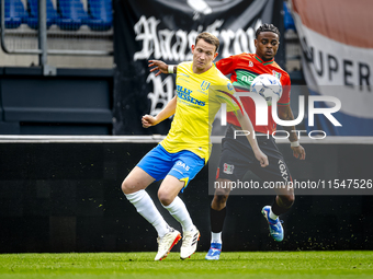 NEC player Sontje Hansen and RKC player Julian Lelieveld during the match RKC vs. NEC (friendly) at the Mandemakers Stadium for the Dutch Er...